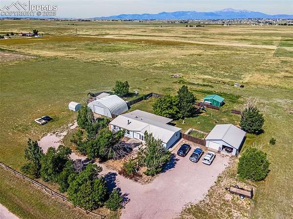 5 Acres of Residential Land with Home for Sale in Peyton, Colorado