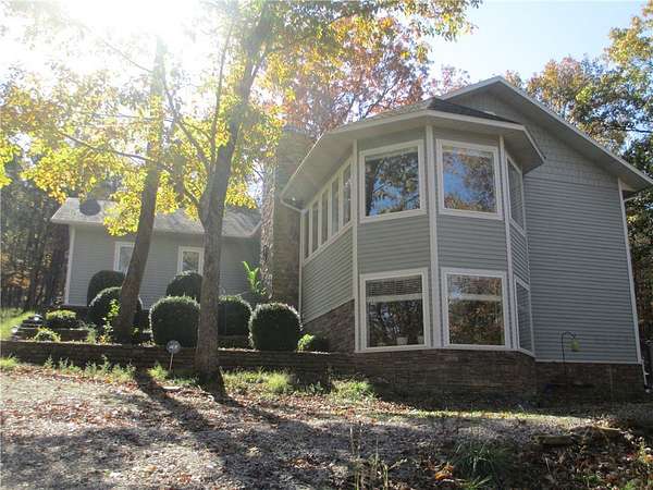 1.63 Acres of Land with Home for Sale in Holiday Island, Arkansas