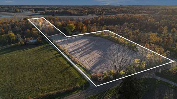 6.1 Acres of Land for Sale in Eau Claire, Michigan