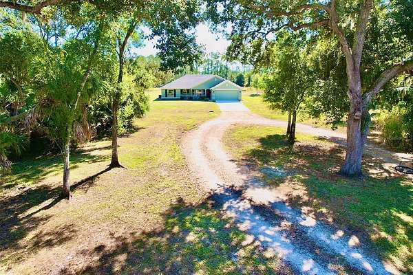 3 Acres of Residential Land with Home for Sale in North Port, Florida