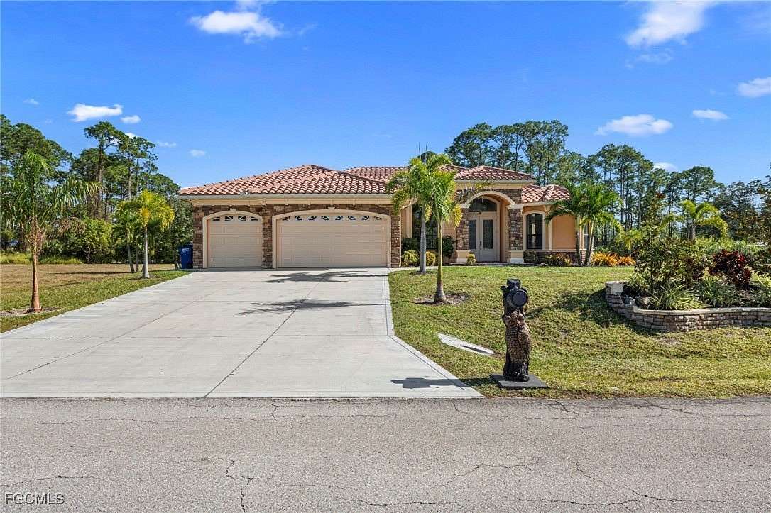 2 Acres of Residential Land with Home for Sale in Lehigh Acres, Florida