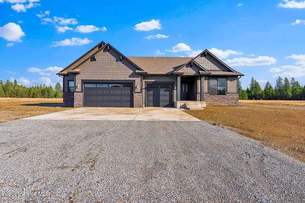 4.85 Acres of Residential Land with Home for Sale in Rathdrum, Idaho