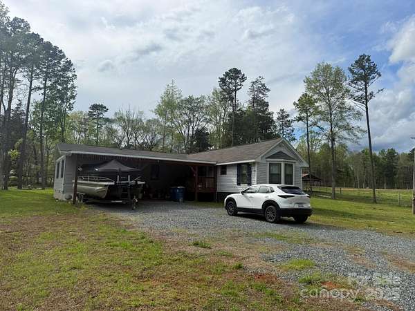 1.5 Acres of Residential Land with Home for Sale in Midland, North Carolina