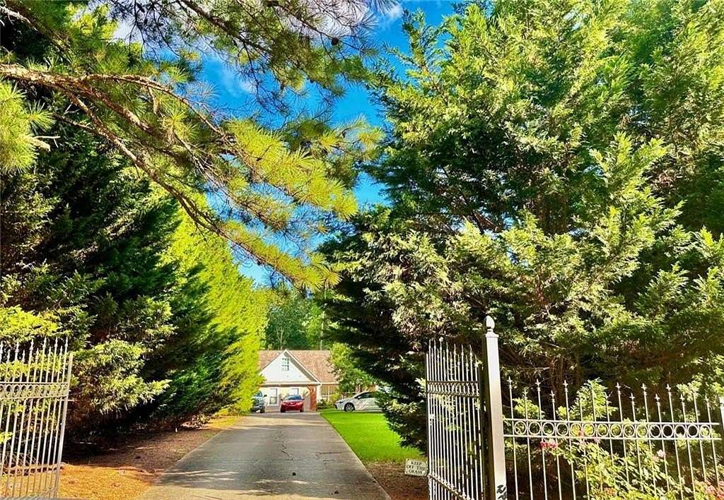 1.77 Acres of Residential Land with Home for Sale in Lawrenceville, Georgia