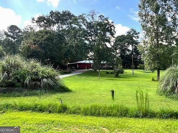 3.1 Acres of Residential Land with Home for Sale in Austell, Georgia