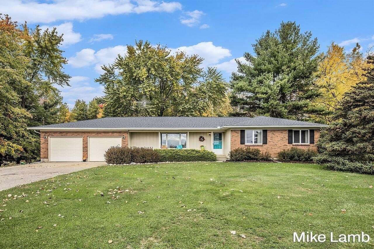 5 Acres of Residential Land with Home for Sale in Sparta, Michigan