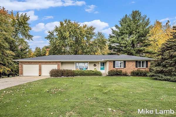 5 Acres of Residential Land with Home for Sale in Sparta, Michigan