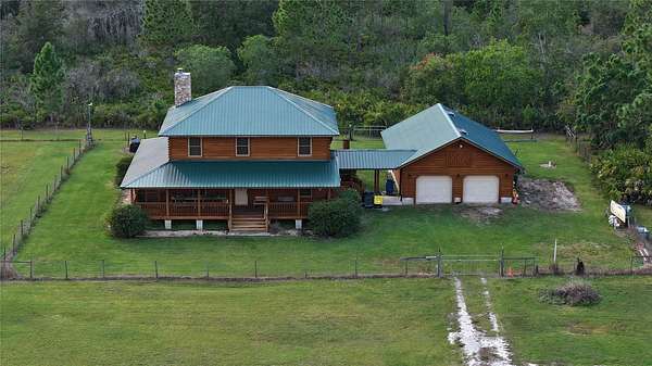 4 Acres of Residential Land with Home for Sale in Polk City, Florida