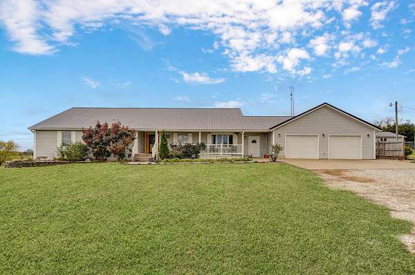 5 Acres of Residential Land with Home for Sale in Rogersville, Missouri