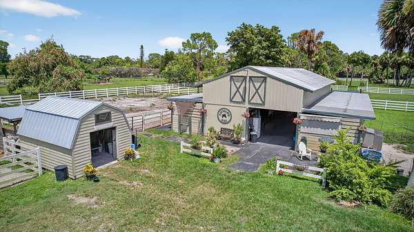 6.12 Acres of Land with Home for Sale in Loxahatchee Groves, Florida