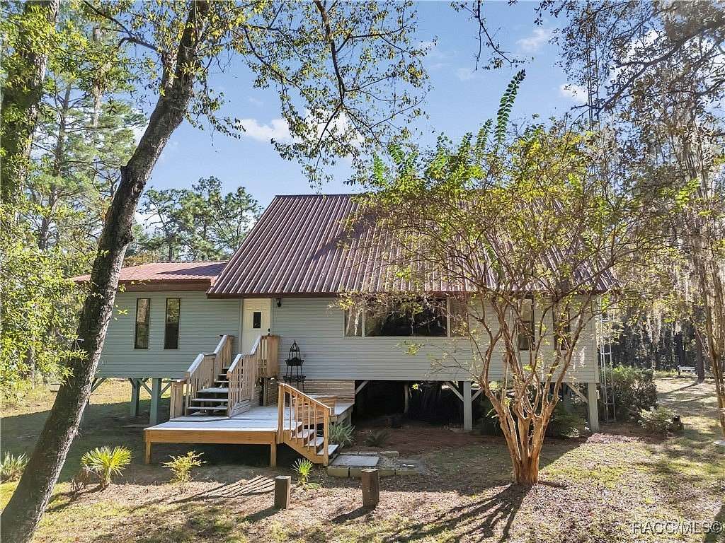 5 Acres of Residential Land with Home for Sale in Floral City, Florida