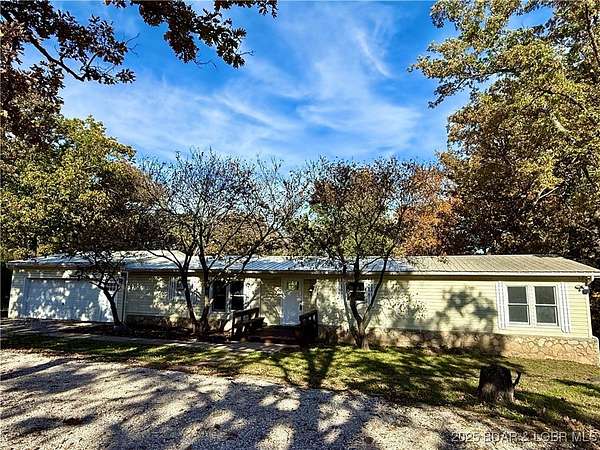 1.54 Acres of Residential Land with Home for Sale in Linn Creek, Missouri