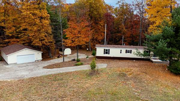 16 Acres of Land with Home for Sale in Shelby, Michigan