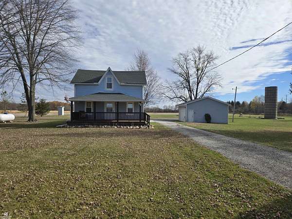 5 Acres of Residential Land with Home for Sale in Avoca, Michigan
