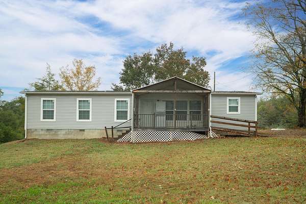8.7 Acres of Land with Home for Sale in Athens, Tennessee