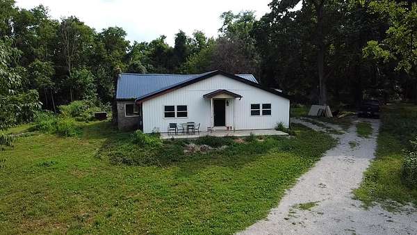 14.2 Acres of Land with Home for Sale in Laurel, Indiana