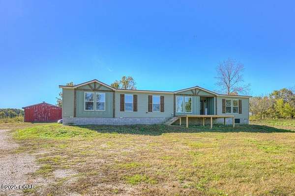 28 Acres of Land with Home for Sale in Stella, Missouri