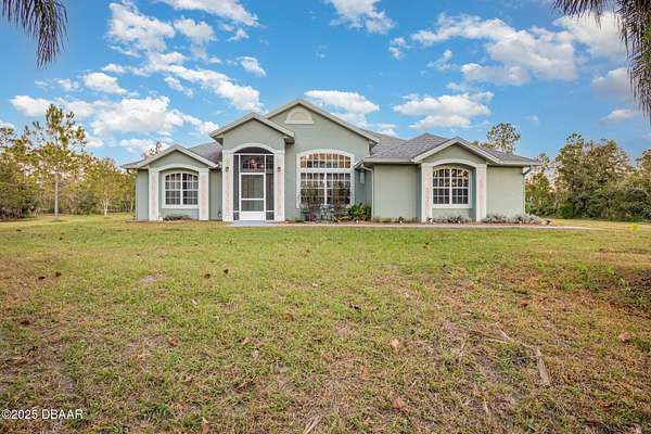 4.88 Acres of Residential Land with Home for Sale in New Smyrna Beach, Florida