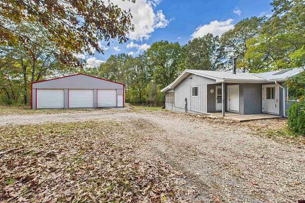 5 Acres of Residential Land with Home for Sale in Flippin, Arkansas