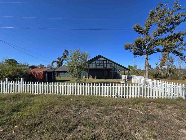 1.6 Acres of Residential Land with Home for Sale in Briarcliff, Arkansas