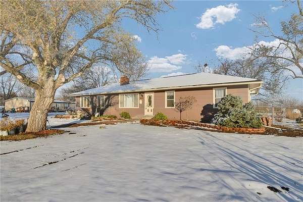 10 Acres of Land with Home for Sale in East Lynne, Missouri