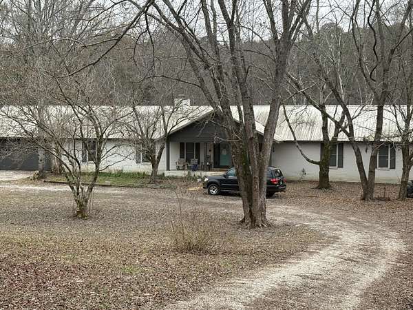 4.26 Acres of Land with Home for Sale in New Albany, Mississippi