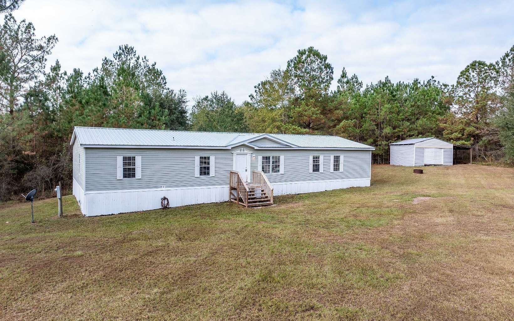 5 Acres of Residential Land with Home for Sale in Wellborn, Florida