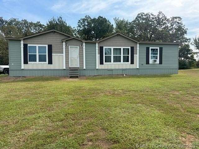 5 Acres of Residential Land with Home for Sale in Gans, Oklahoma