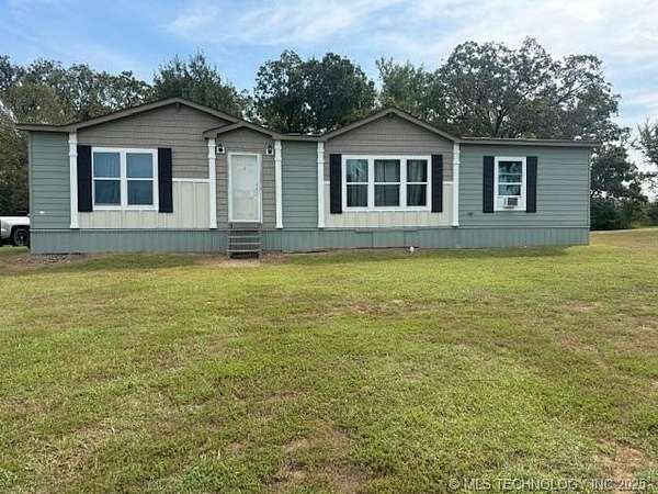 5 Acres of Residential Land with Home for Sale in Gans, Oklahoma