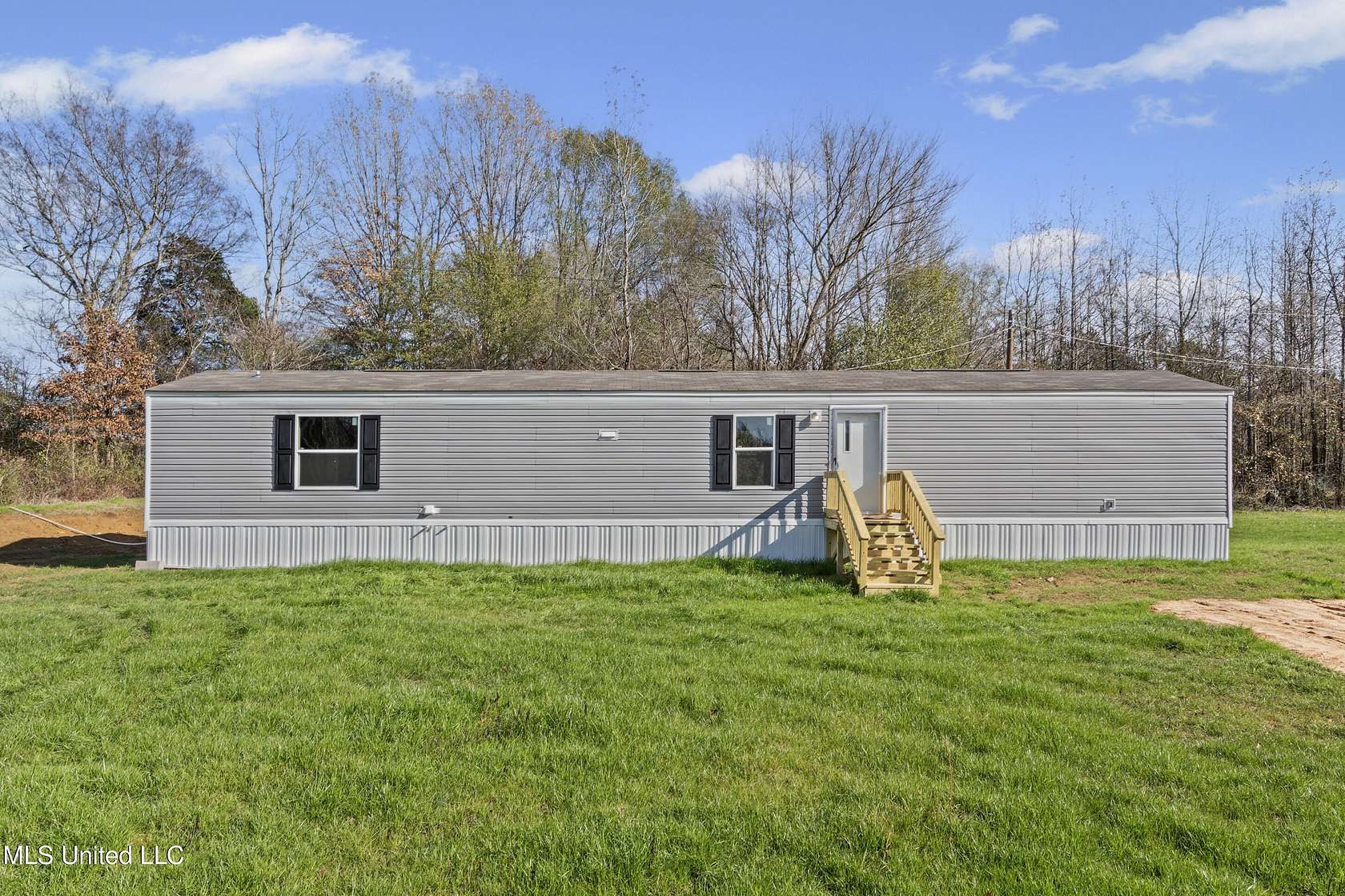 5 Acres of Residential Land with Home for Sale in Sardis, Mississippi