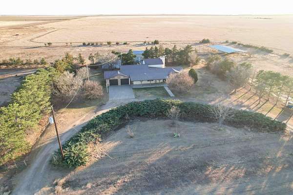 6 Acres of Residential Land with Home for Sale in Dumas, Texas