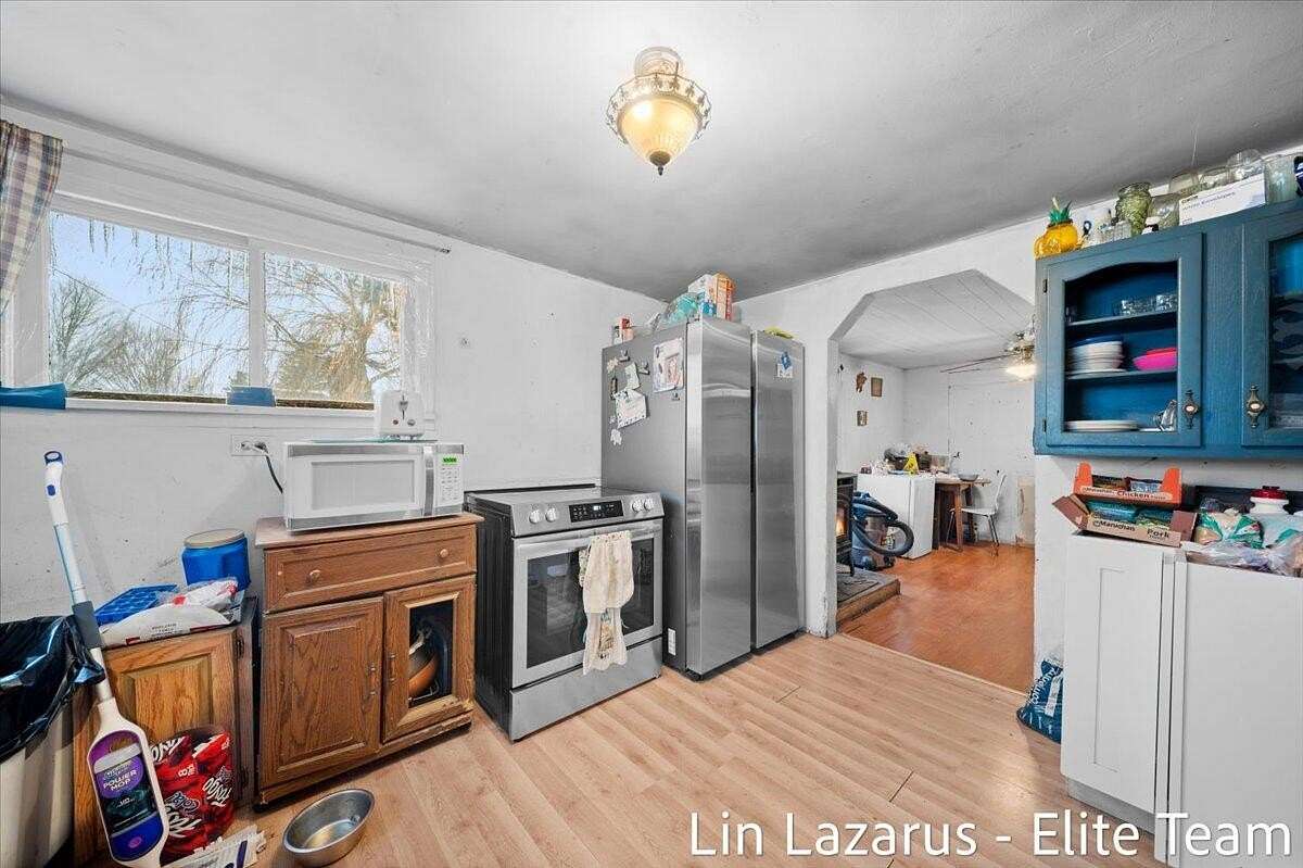 10 Acres of Recreational Land with Home for Sale in Cedar Springs, Michigan