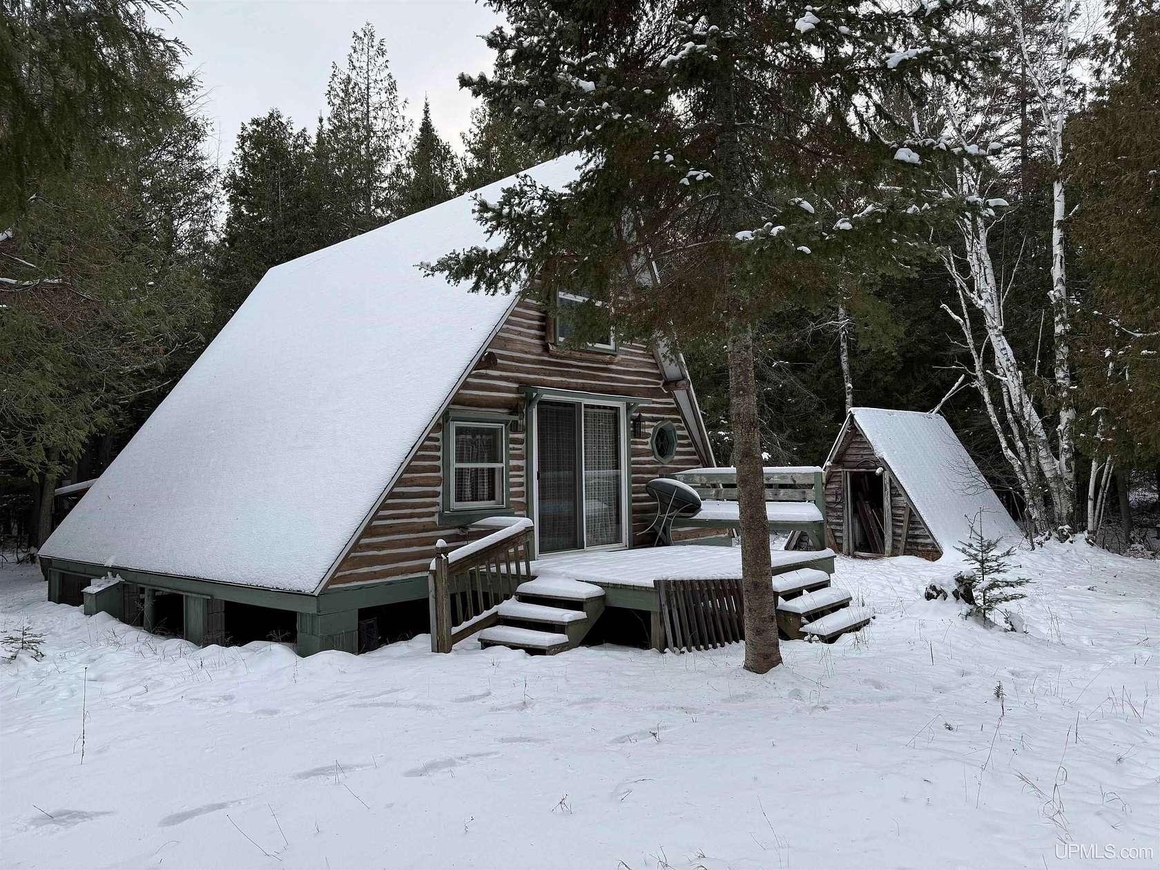 12.5 Acres of Recreational Land with Home for Sale in Garden, Michigan