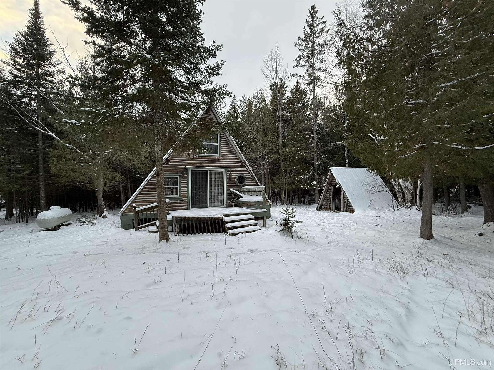 12.5 Acres of Recreational Land with Home for Sale in Garden, Michigan