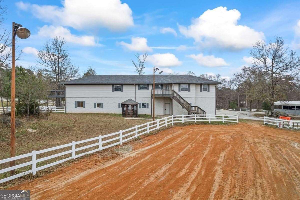 11.3 Acres of Land with Home for Sale in Conyers, Georgia