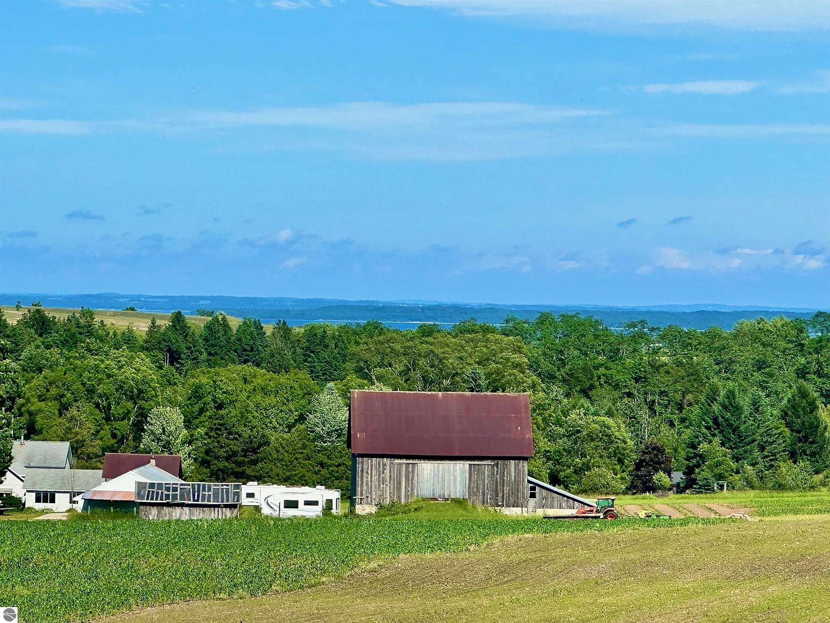 29.2 Acres of Agricultural Land with Home for Sale in Suttons Bay, Michigan