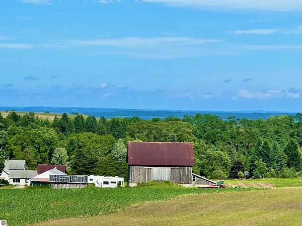 29.2 Acres of Agricultural Land with Home for Sale in Suttons Bay, Michigan