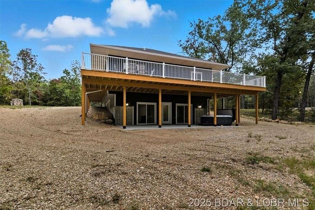 5.24 Acres of Residential Land with Home for Sale in Camdenton, Missouri