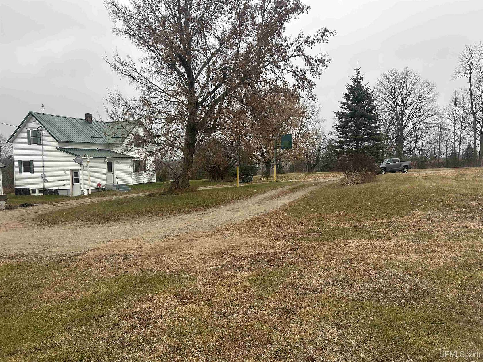 120 Acres of Agricultural Land with Home for Sale in Carney, Michigan