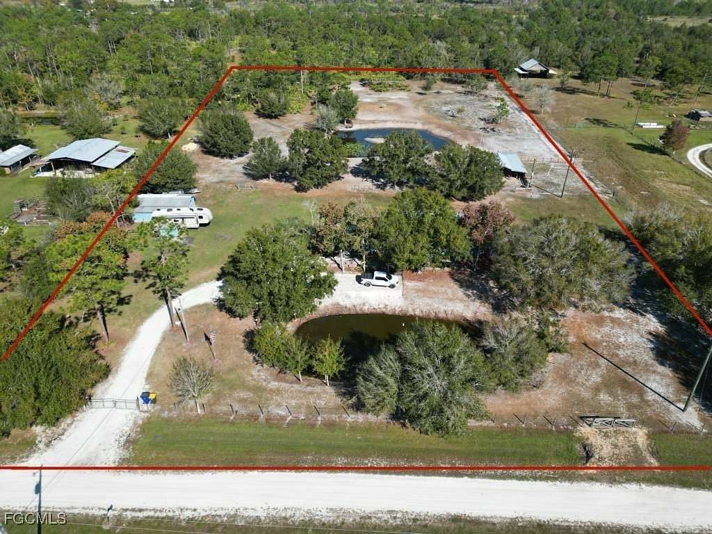 5 Acres of Residential Land with Home for Sale in Venus, Florida