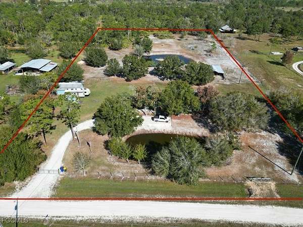 5 Acres of Residential Land with Home for Sale in Venus, Florida