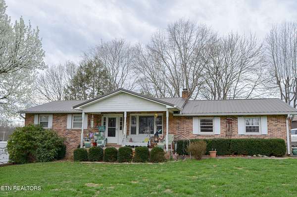 30 Acres of Land with Home for Sale in Deer Lodge, Tennessee