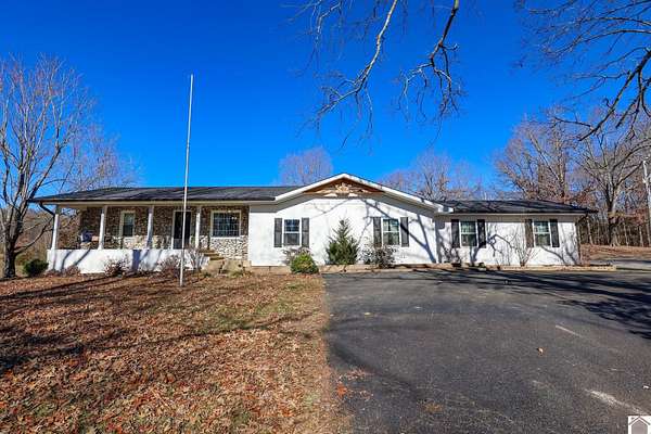 14.6 Acres of Land with Home for Sale in Boaz, Kentucky