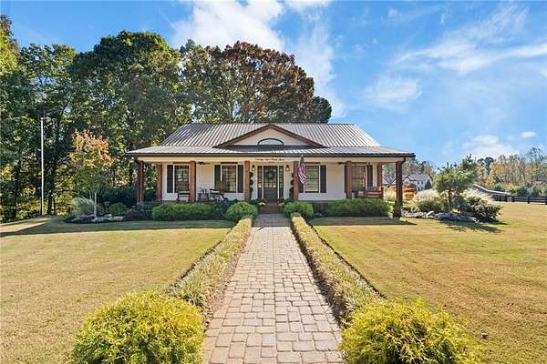 2.29 Acres of Residential Land with Home for Sale in Alpharetta, Georgia