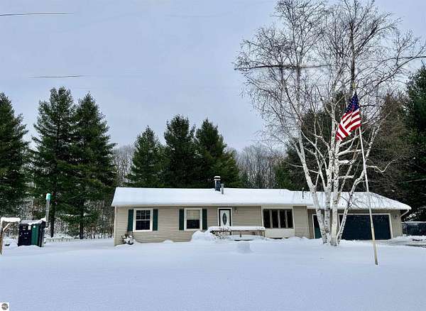 10 Acres of Land with Home for Sale in Grawn, Michigan