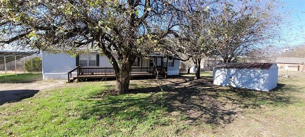 2.59 Acres of Residential Land with Home for Sale in Weatherford, Texas