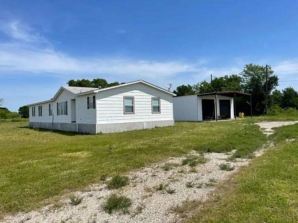 7.69 Acres of Residential Land with Home for Sale in Caddo Mills, Texas