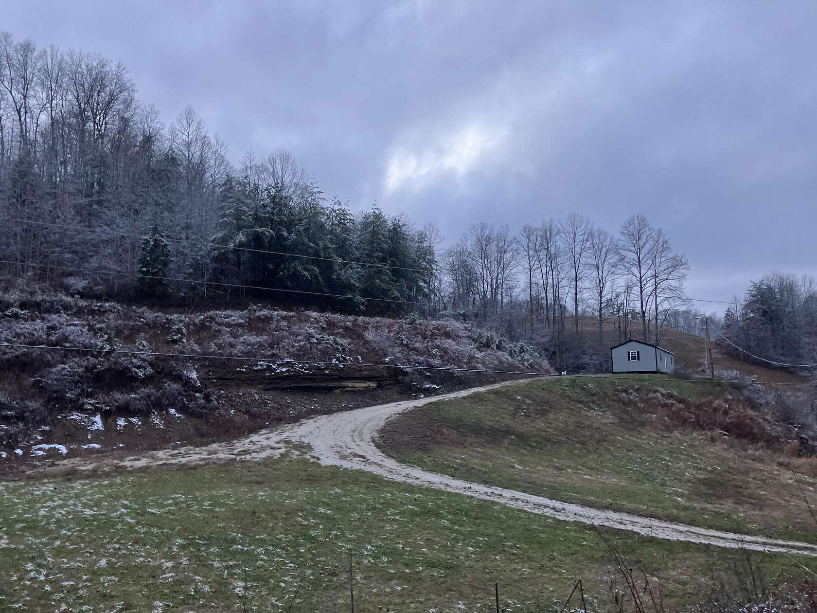 8.5 Acres of Land with Home for Sale in West Liberty, Kentucky