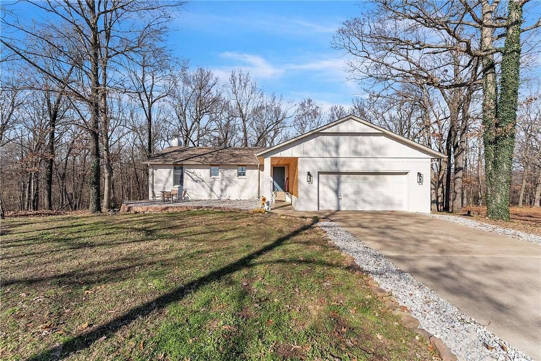 5.88 Acres of Land with Home for Sale in Lowell, Arkansas