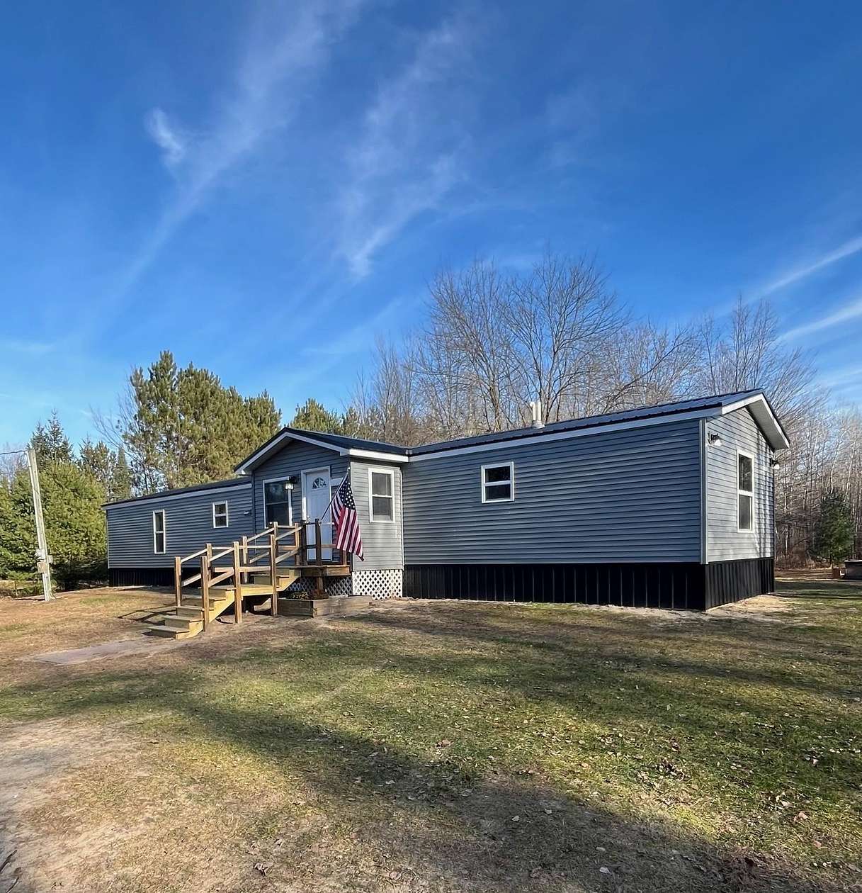 10 Acres of Recreational Land with Home for Sale in Beaverton, Michigan